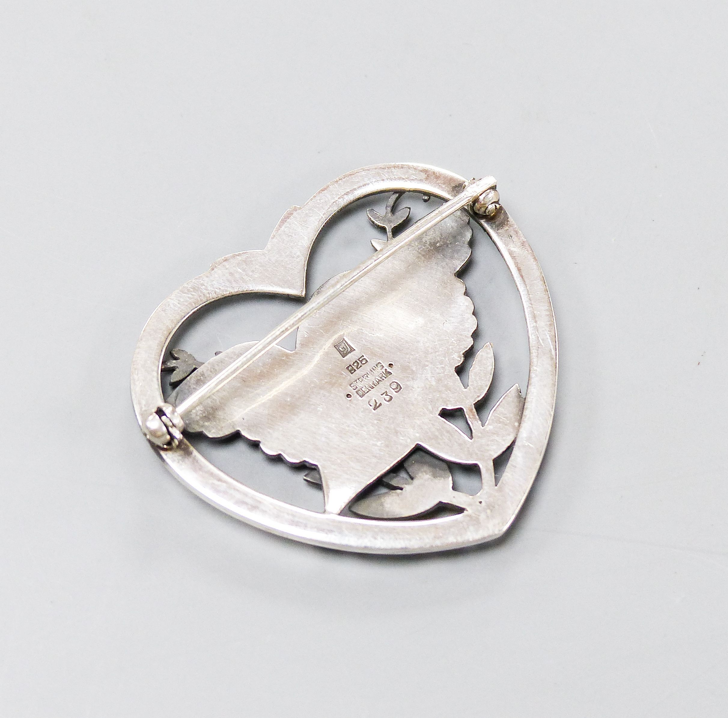 A Georg Jensen sterling robin and frond heart shaped brooch, no. 239, 41mm.